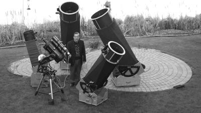 Mike Lynch with telescopes.jpg