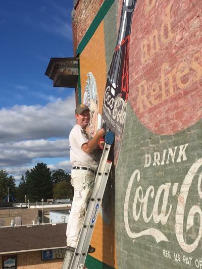 Historic NB Coca-Cola mural gets a face lift