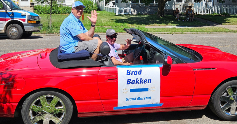 Man marshals parade 20 years after his mom — in the same car