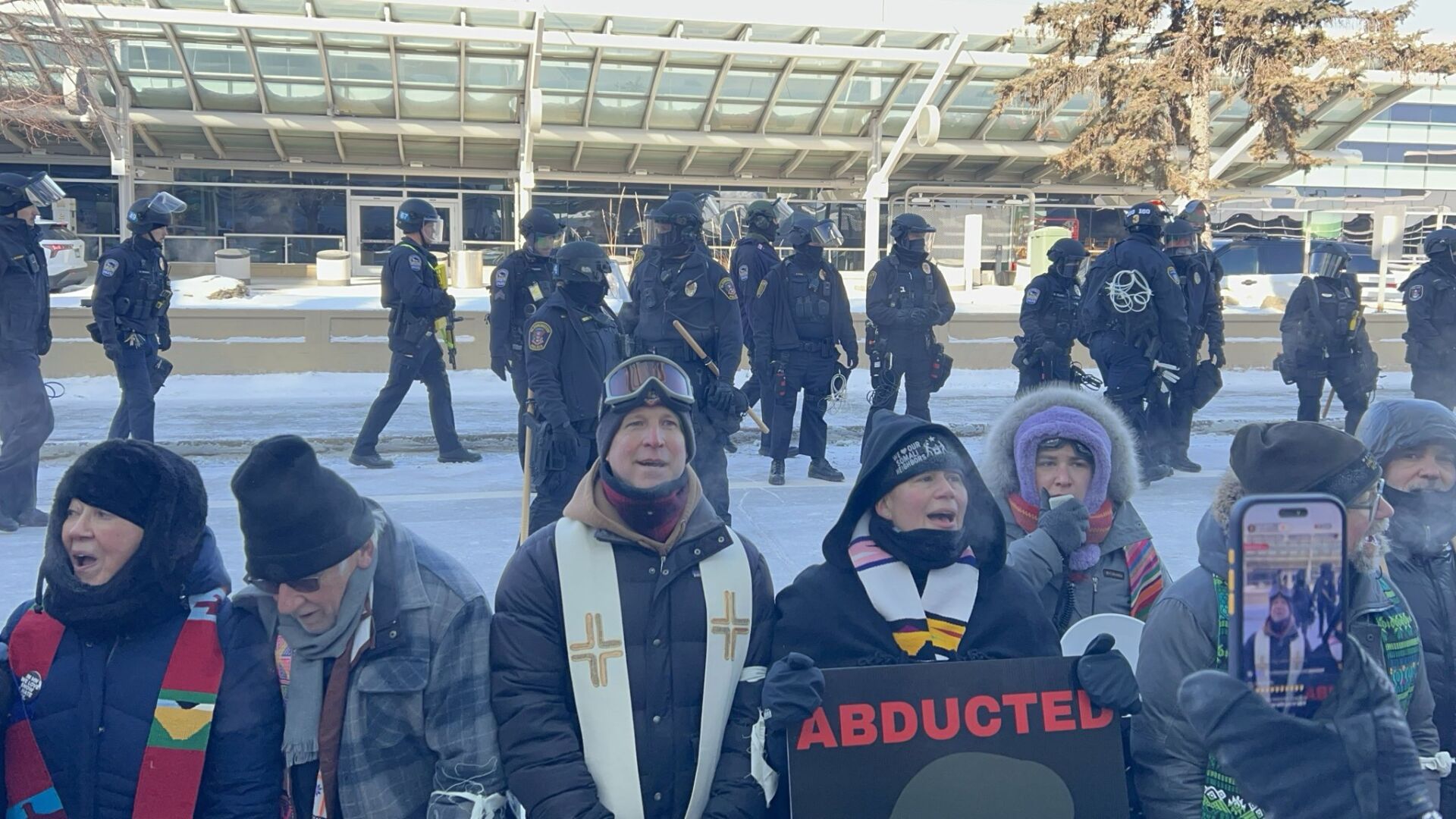 100 Minnesota clergy arrested at MSP airport while denouncing ICE surge ...