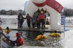 Other Text A group that included the Coon Rapids falcon jumped into the lake at the Polar Plunge at the Anoka County Polar Plunge at Lakeside Commons Park on Saturday, Feb. 28. Alt Text