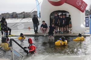 Other Text Totino Grace and St Anthony LaCrosse team up to take the plunge at the Anoka County Polar Plunge at Lakeside Commons Park on Saturday, Feb. 28. Alt Text