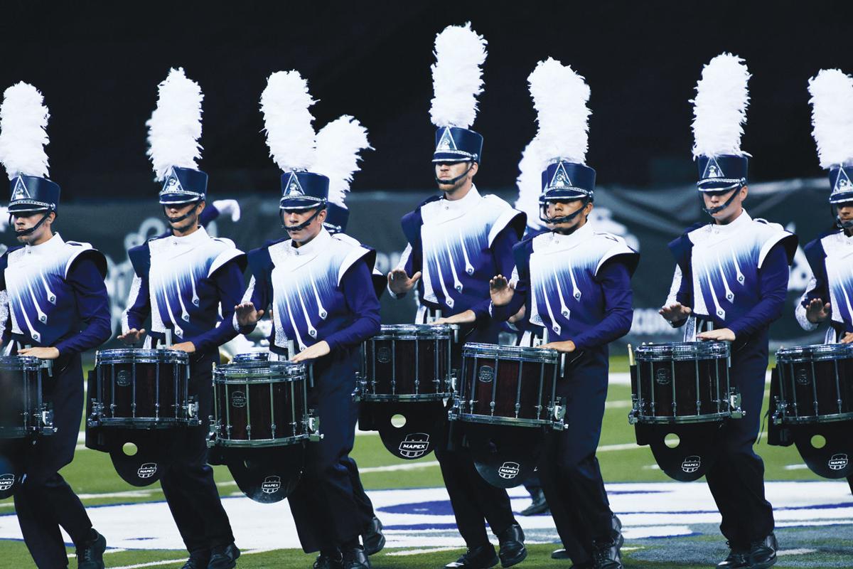 Drum and bugle corps march into Farmington Sun This Week