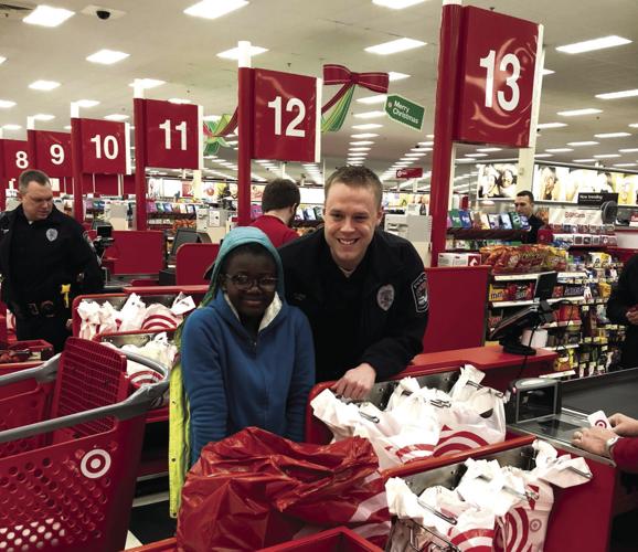 Champlin Target aisles filled with smiles during annual Shop with a Cop