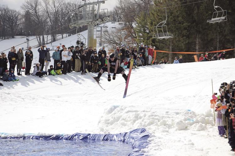 On it or in it Hyland Hills Ski Area's annual Härdsmälta Pond Skim