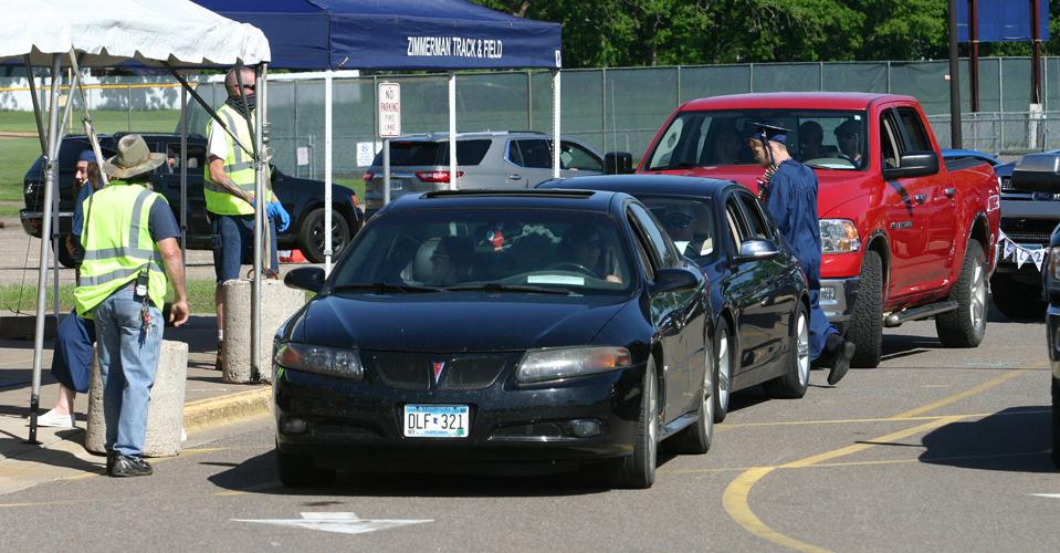 Zimmerman seniors get diplomas in outdoor parade setting Elk River