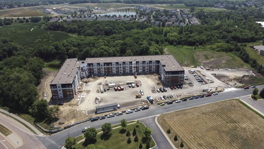Pair of apartment complexes taking shape, Community