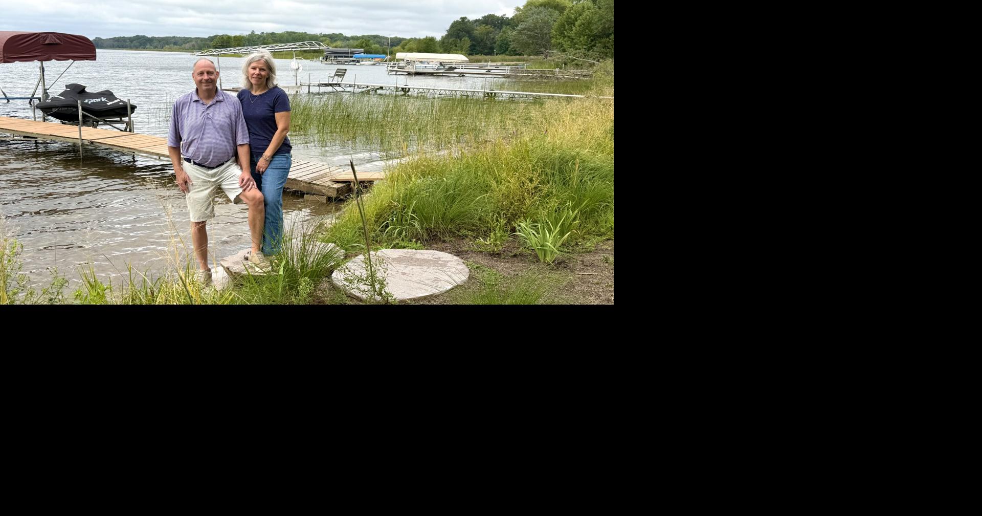 A restored shoreline and two very happy dogs