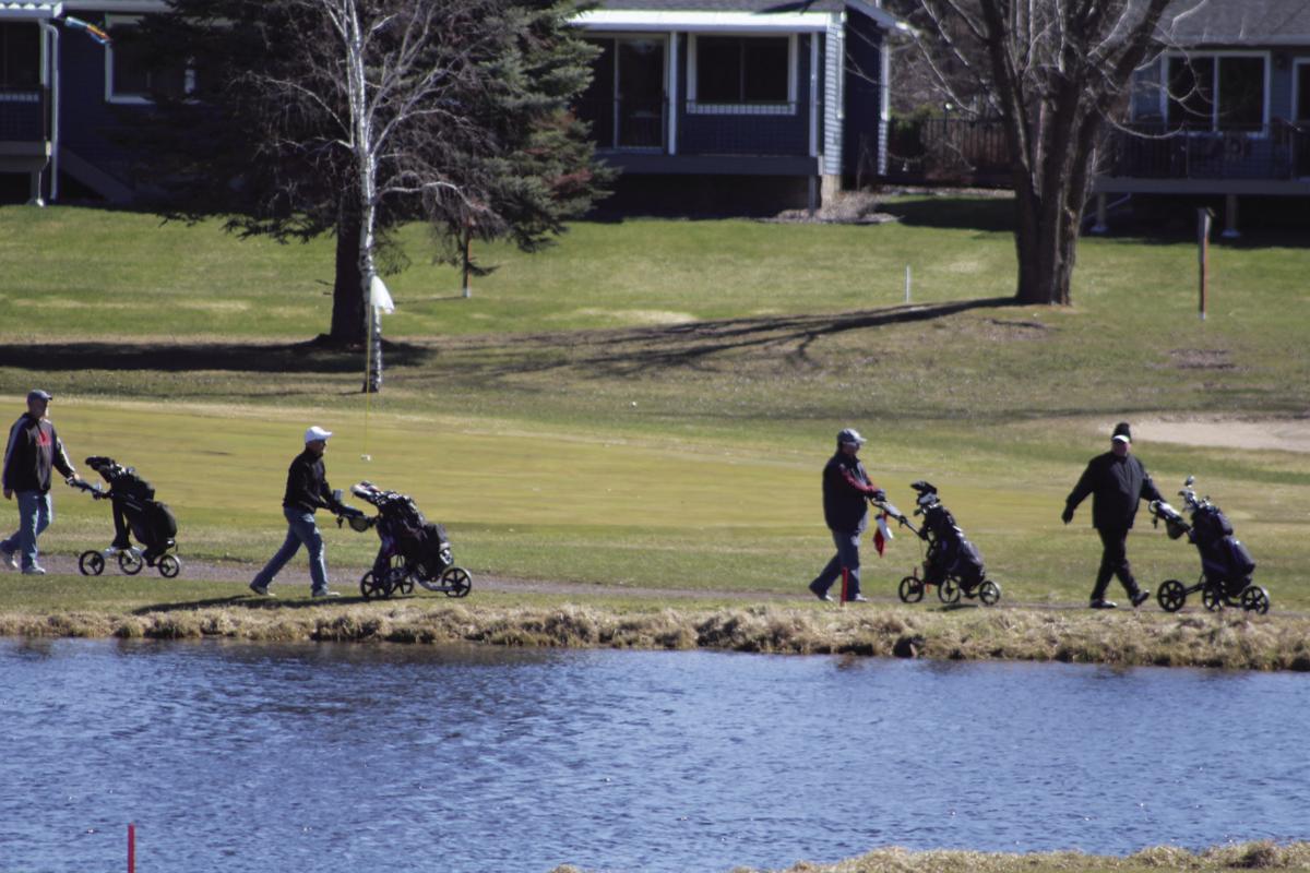 Locals Take To The Greens Forest Lake Times Hometownsource Com