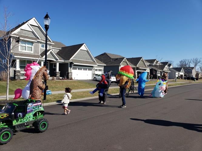 Blaine residents bring smiles to neighbors with costume parade Free