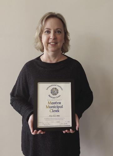 Maple Grove s city clerk reaches highest level in program Free