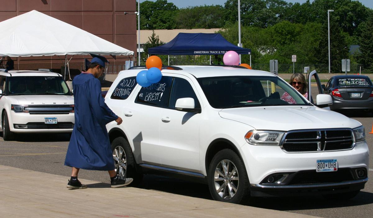 Zimmerman seniors get diplomas in outdoor parade setting Elk River