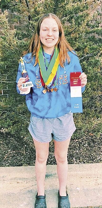 Libby Morey swims well in state meet