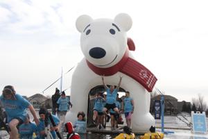 Other Text Sin City fitness takes part in the Polar Plunge at the Anoka County Polar Plunge at Lakeside Commons Park on Saturday, Feb. 28. Alt Text