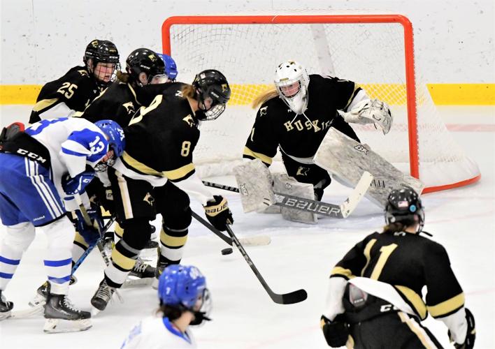 SP ANDOVER GOALIE COURTNEY STAGMAN TRACKS A SAVE VS. MINNETONKA.jpg