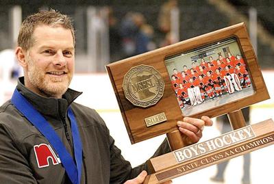 eigner trent hockey named coach academy thomas st hometownsource lakeville north holds trophy tournament aa won boys class state after