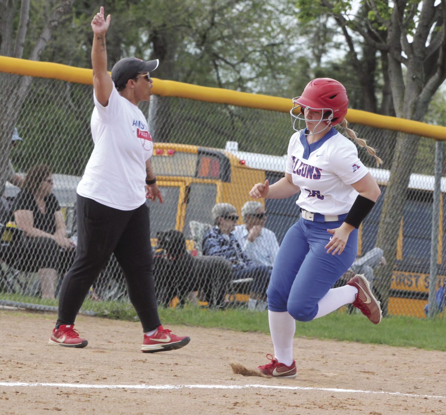Falcons softball earns two wins after falling to Trojans