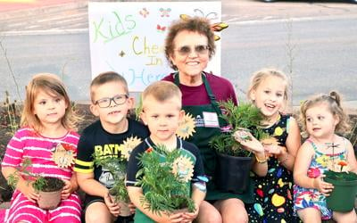 Monticello Pollinator Planting Lindas with kids
