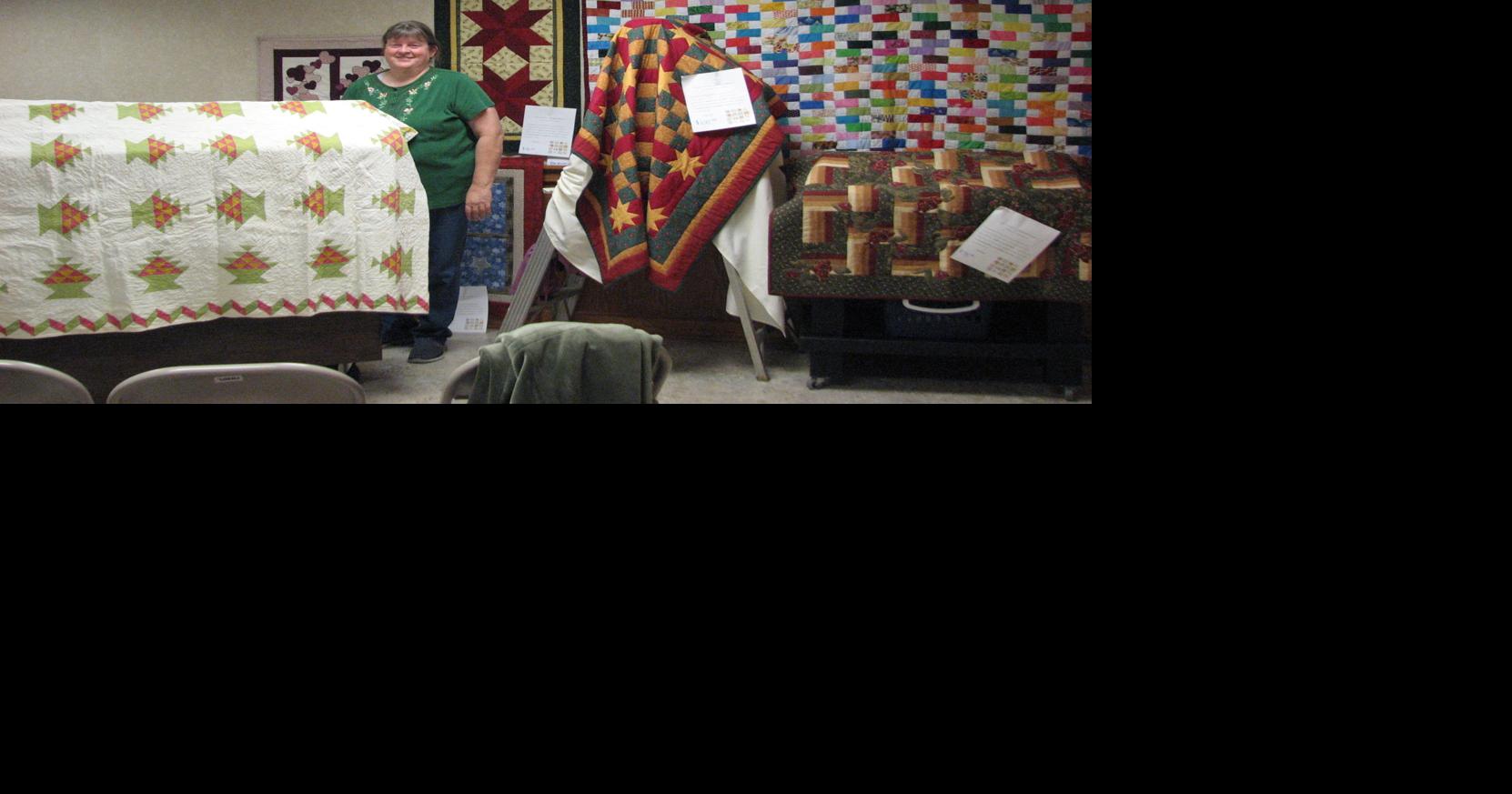 Area quilters raise funds for New Albin Public library Caledonia