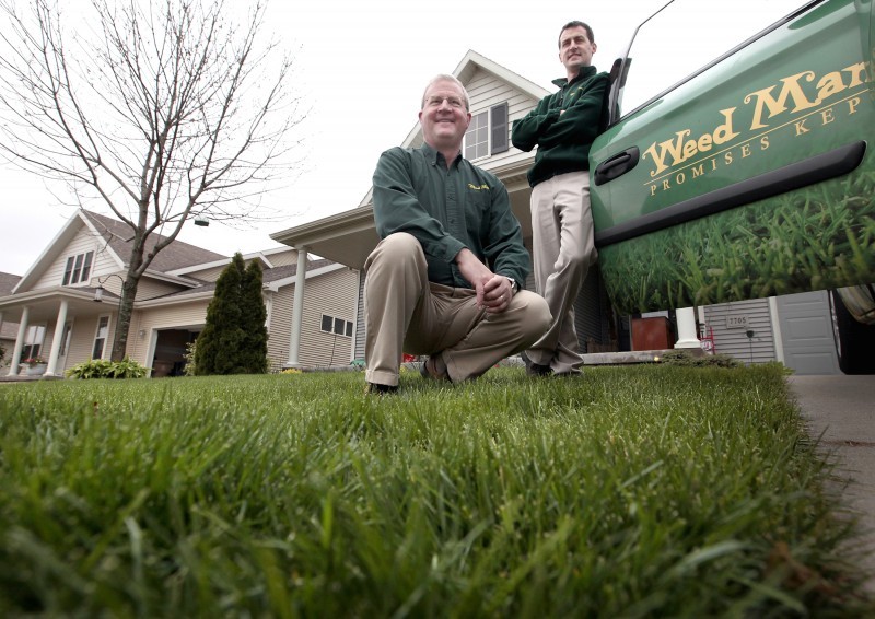 In the Family Business Dad, son own Weed Man Lawn Care