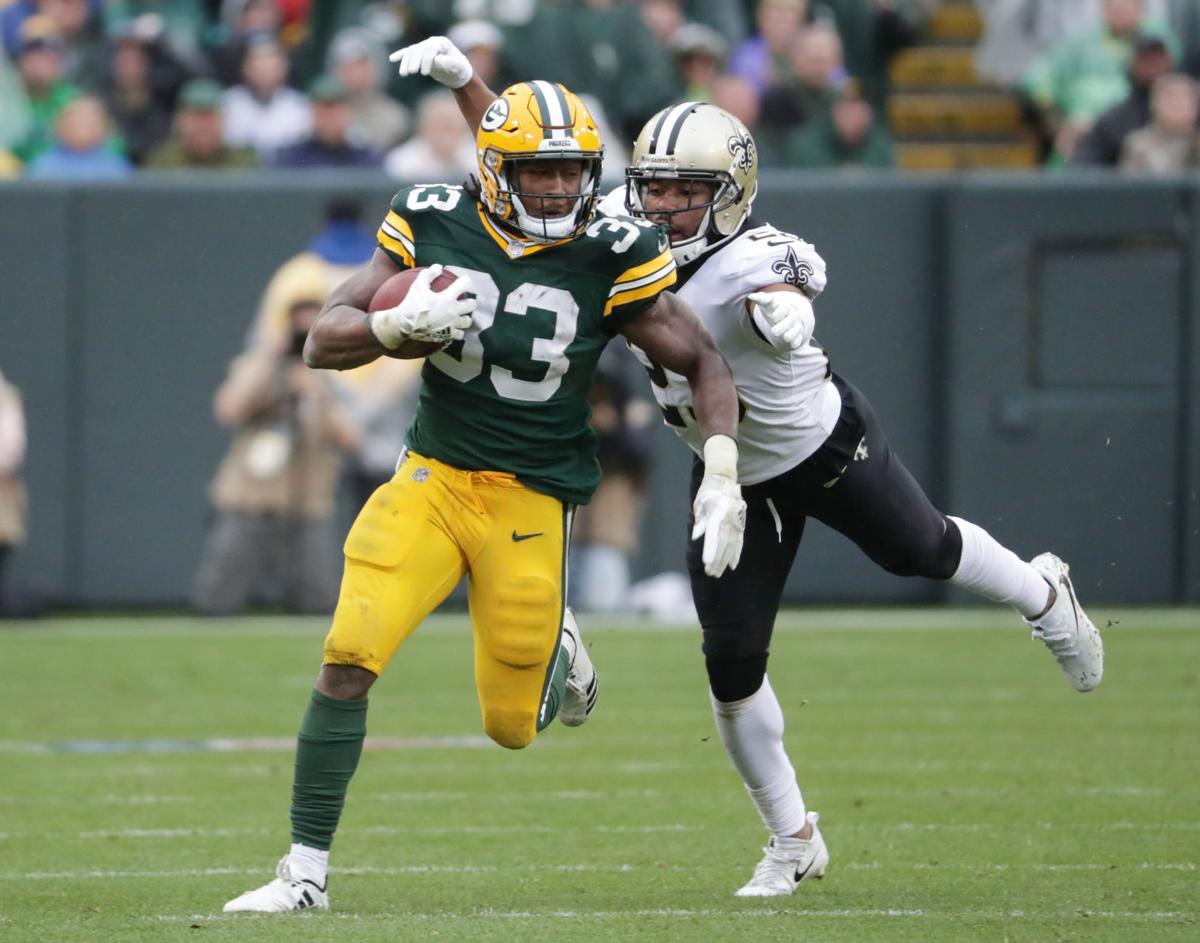 Packers Green Bay's Aaron Jones shines on otherwise dreary day at