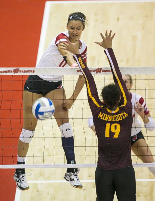 Tionna Williams makes a kill, Badgers volleyball