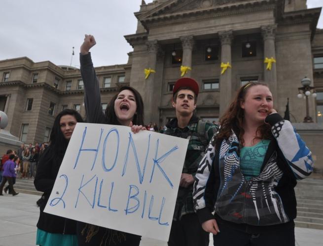High school students walk out of class, gather to protest | Complete ...