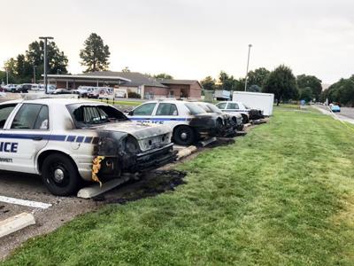 Burned police cars