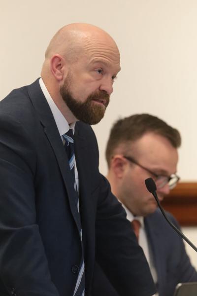 Judge rules against motions to disqualify Wood as ...
