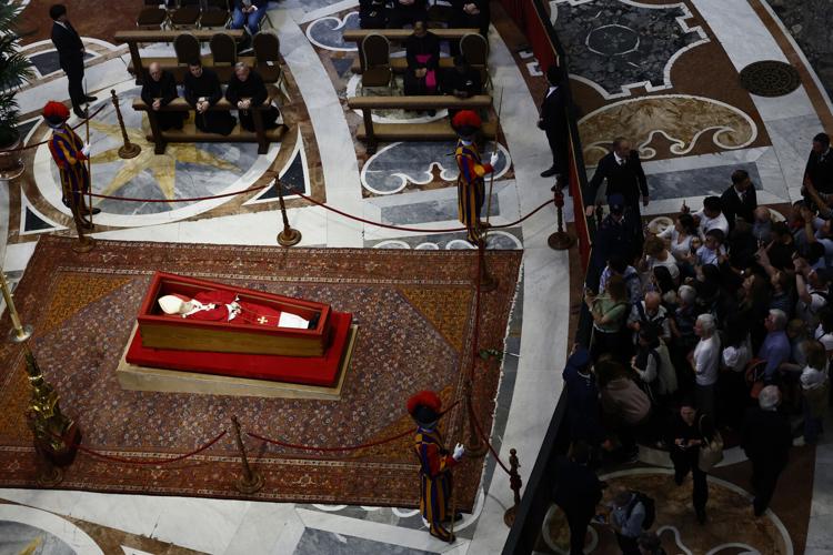 Tens of thousands file into St. Peter's Basilica to pay final respects