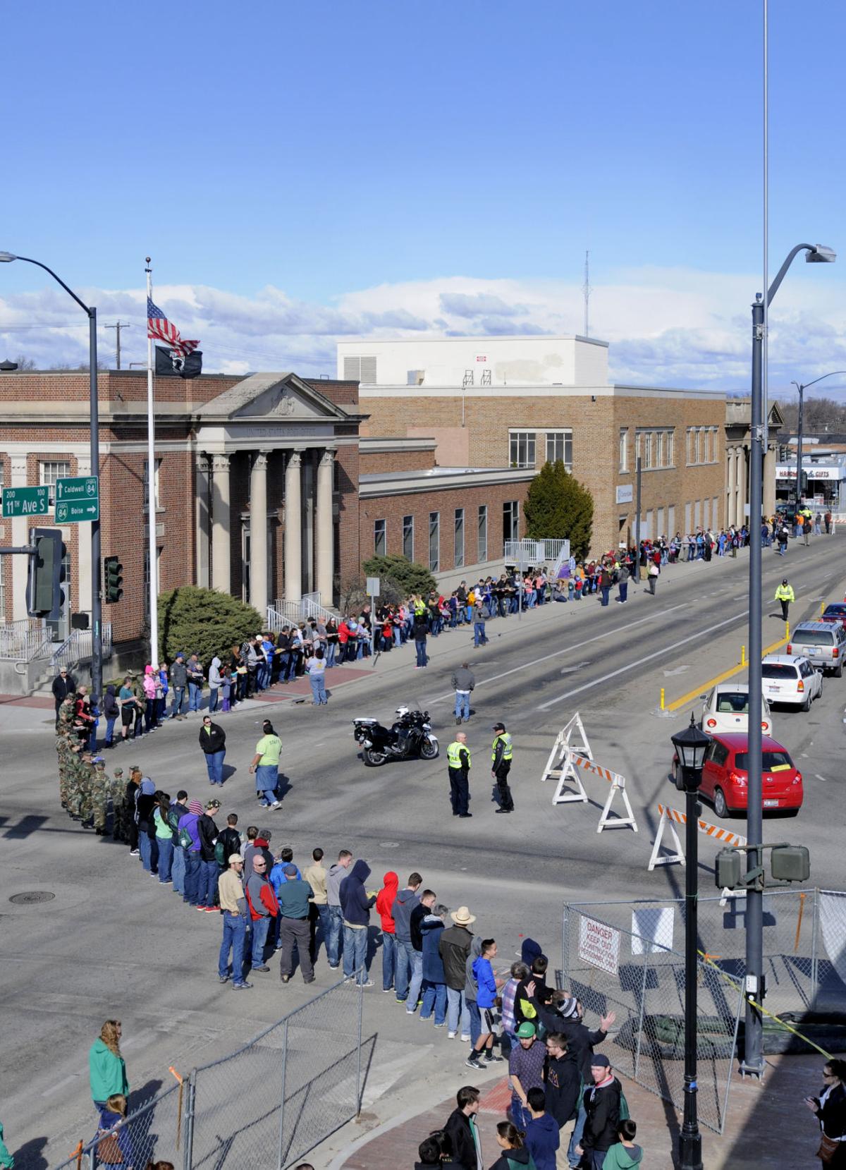 Hundreds of people line downtown Nampa for the Great Book Brigade