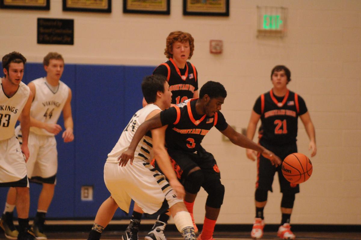 Middleton vs. Mountain Home Boys Basketball Photos