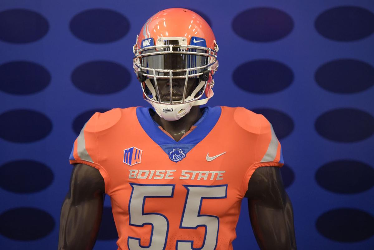 Broncos get back to 'blue collar' with debut of new football uniforms ...