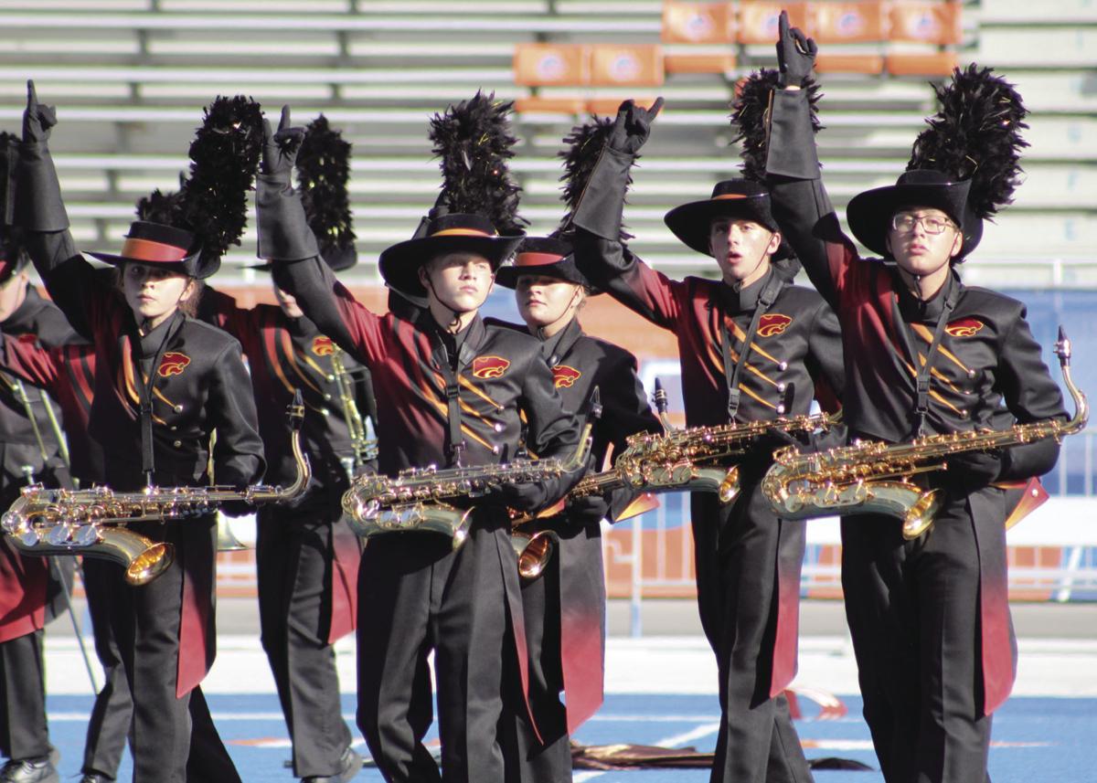 Local high school marching bands compete at DIII Complete news