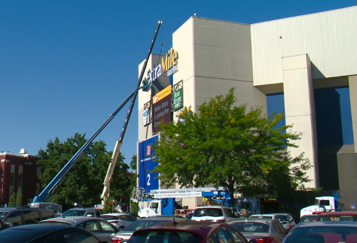 ExtraMile sign going up on former Taco Bell arena