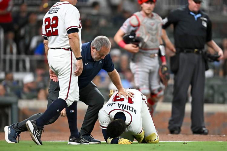 Braves' star Acuña day-to-day after fouling ball off left leg ...