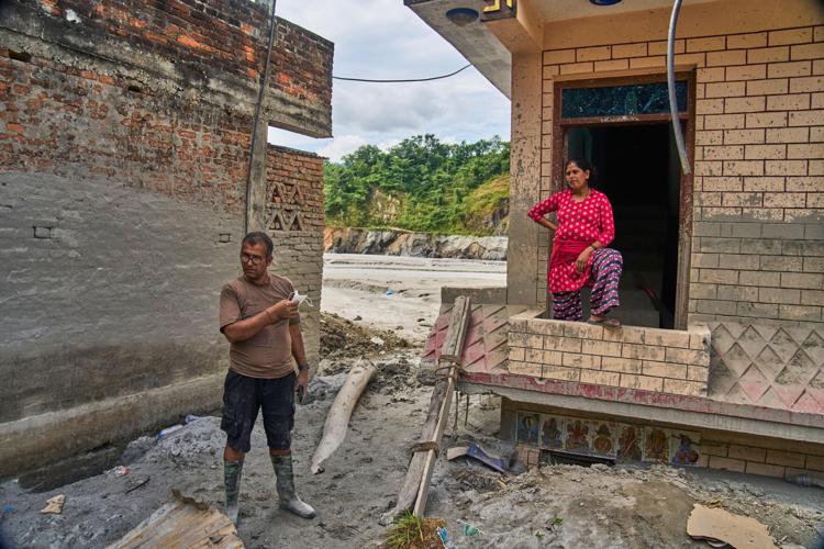 A month after Nepal floods, thousands are still missing and families ...