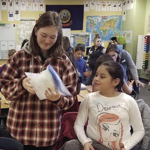 Kuna FFA members teach Reed Elementary students where their food comes