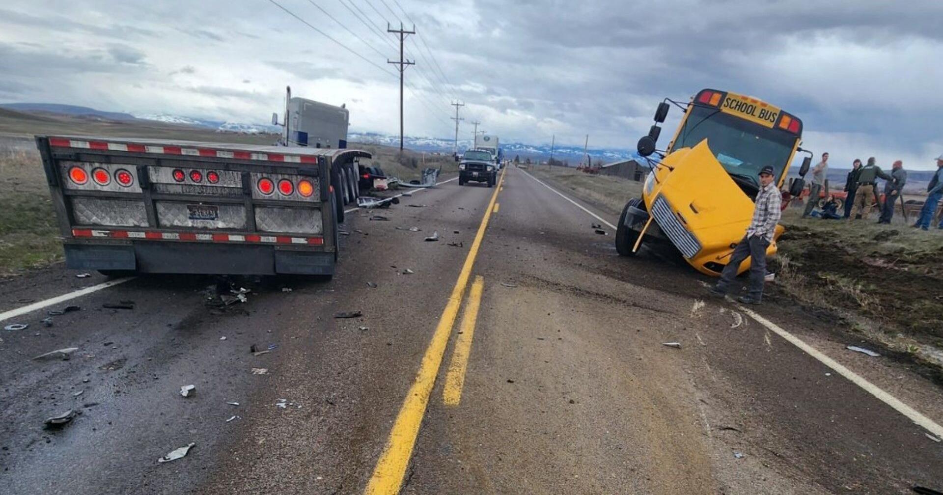 Four people, including 2 juveniles, hospitalized after semi-truck hits school bus - Vimarsana News