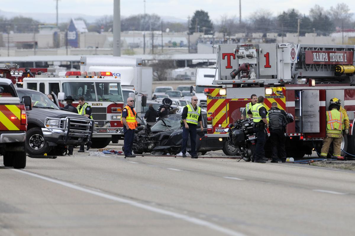 Two vehicle car wreck closes eastbound I84 in Nampa Photos