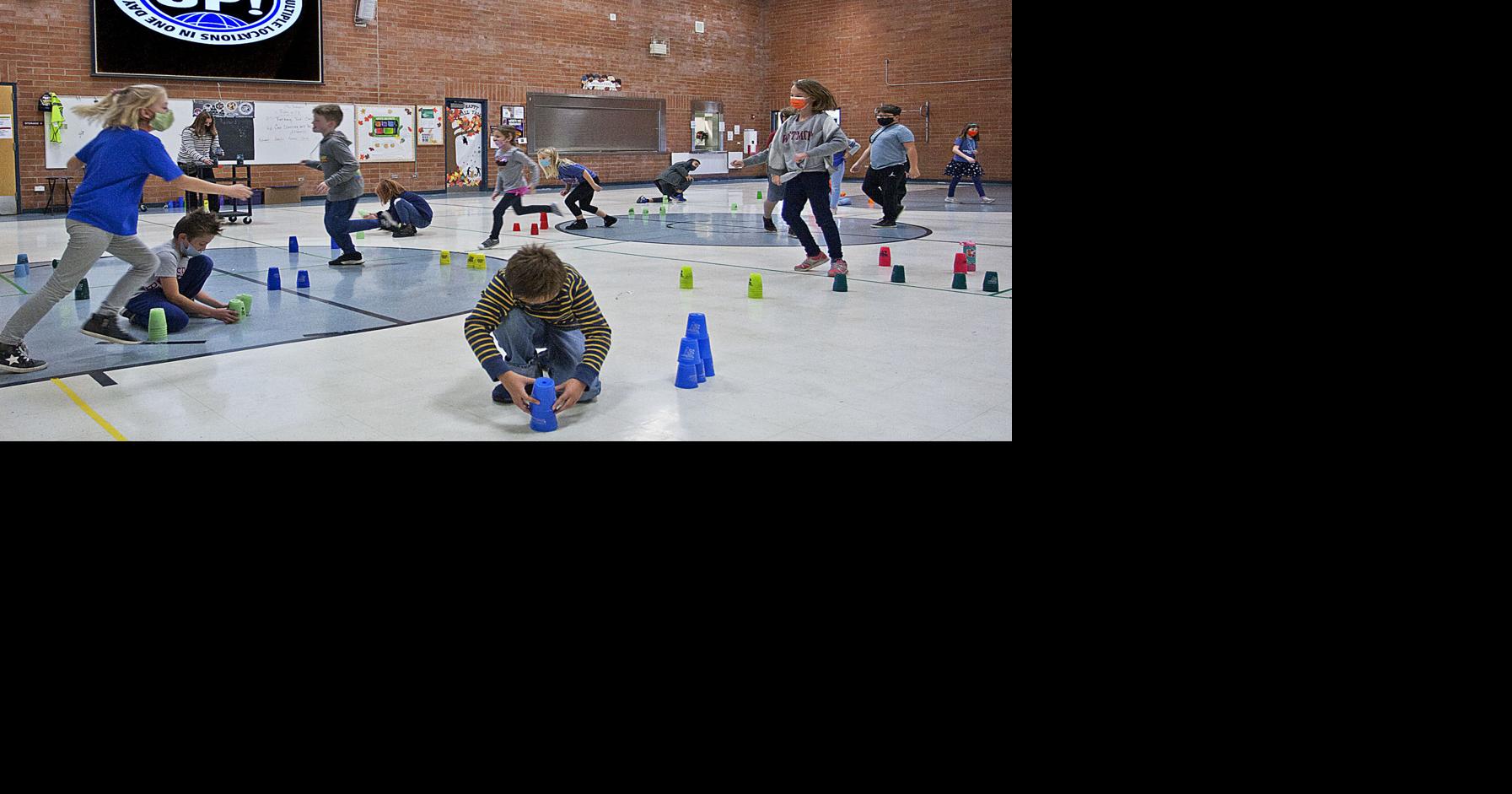 Elementary school students sport stack to break world record | Local ...