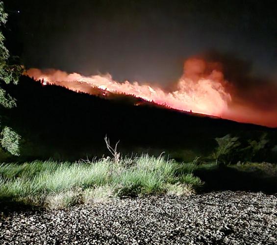 Wildfire above Ola nears containment as suppression efforts continue