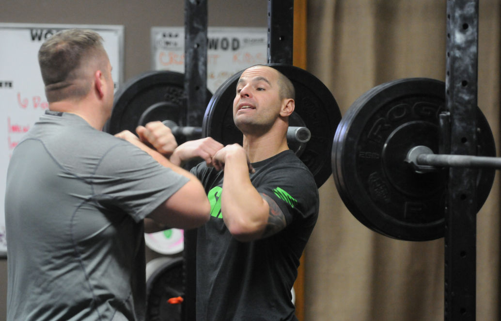 Owners’ contrasting experiences aid gym’s family feel Community