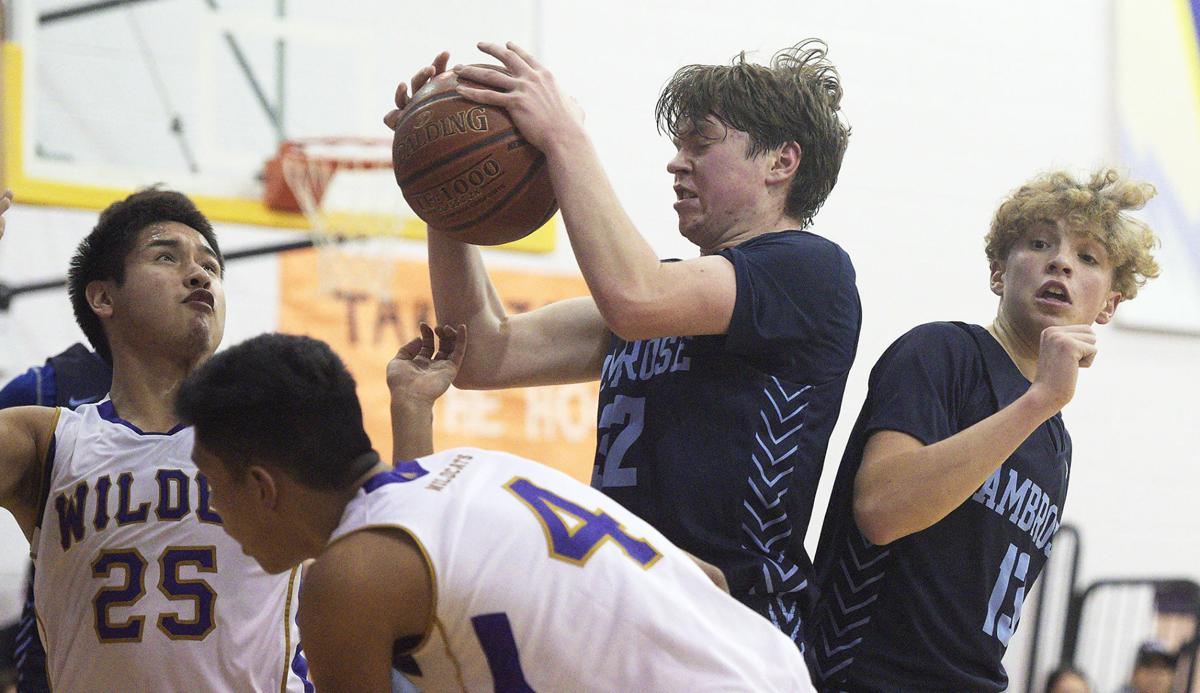 No. 1 Ambrose boys basketball looks the part in 59-24 ...