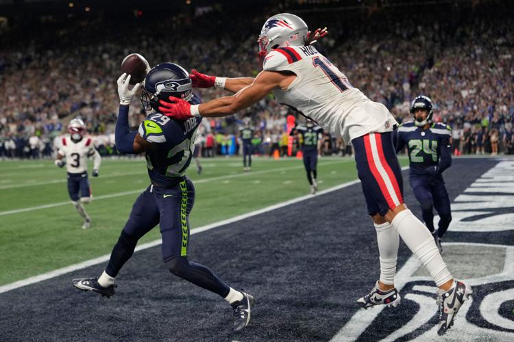 Photos of the NFL season opener, a rare Super Bowl rematch between the Seahawks and Patriots