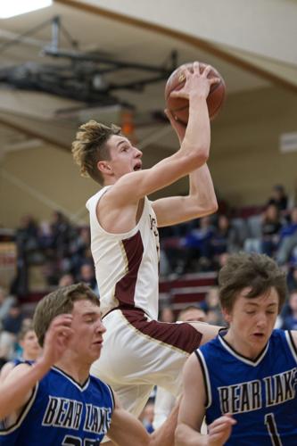 Bryler Shurtliff flying over the Bear defenders for the bucket.jpeg (copy)