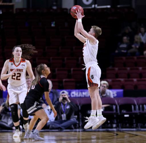 Dora Goles three ball cross court.jpg