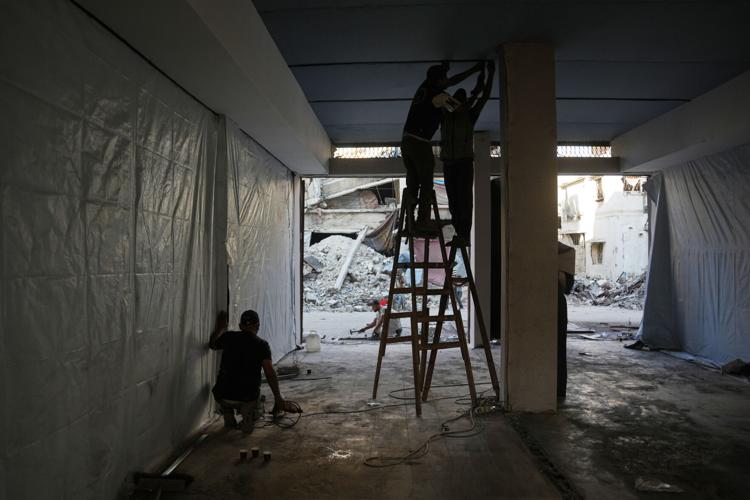 Photos show Palestinians using handmade mud bricks, wood and plastic to rebuild amid Gaza’s rubble