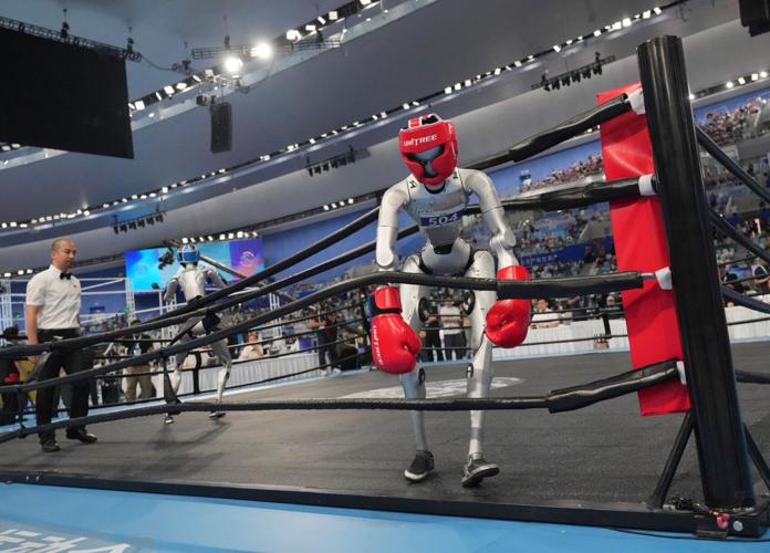 Humanoid robots sprint, play soccer and set records at Beijing games, in photos