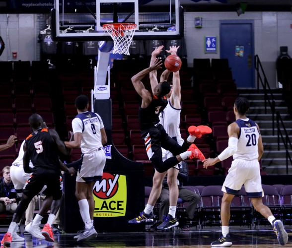 Malik Porter bent back finish in traffic.jpg
